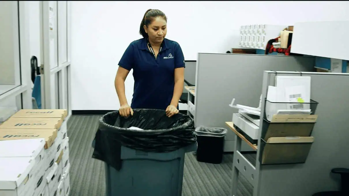 Janitorial staff collecting garbage in Phoenix, AZ